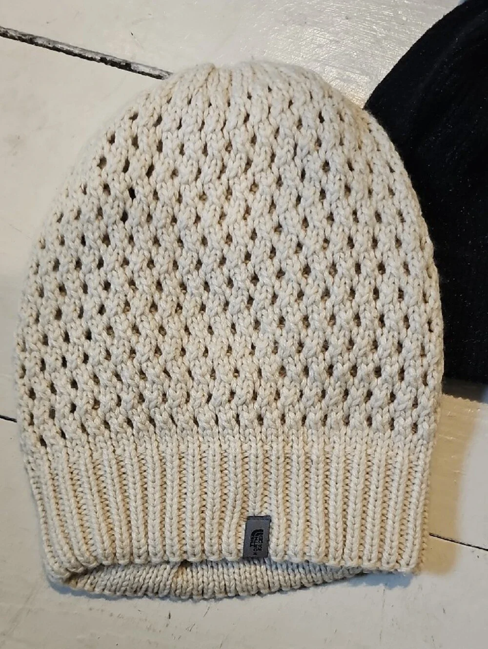 The North Face Cream Knit Slouch Hat & Time And True Black Pom Beanie